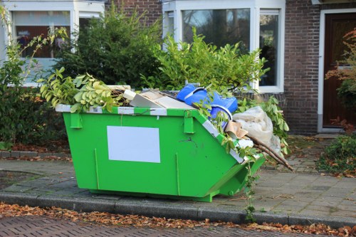 Garden clearance services removing overgrown plants